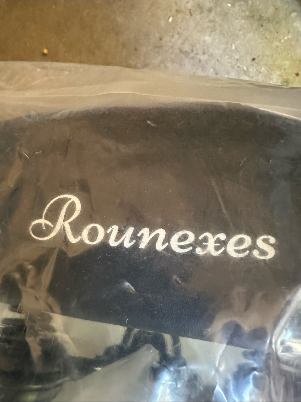 Rounexes Black Logo Pouch